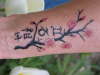 Cherry blossom branch tattoo