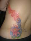 Lotus and fiery dragon tattoo