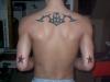 Back Tribal and Nautical Stars tattoo