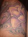 Koi with lotus flowers tattoo