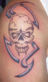 Skull with blue tribal tattoo