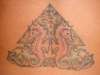 Pyramid seahorse tattoo