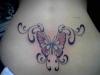 lower back tribal butterfly tattoo
