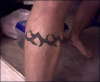 tribal leg band tattoo