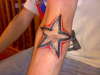 star on elbow tattoo