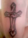 tribal cross tattoo