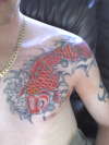 koi chest piece tattoo