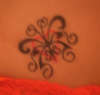 Butterfly with heart design tattoo