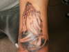 praying hands tattoo