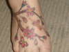 Flowers on foot tattoo