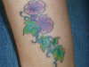 Flowers on wrist tattoo