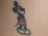 Mickey Mouse on back tattoo