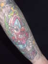 Scary clown in a box tattoo
