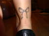 Bow - back of my leg tattoo