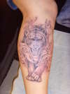 Tiger in smoke tattoo