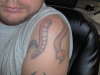 Leo shoulder snake tattoo
