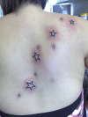 Em's stars tattoo