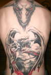 evil back piece tattoo