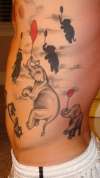 flying elephant herd tattoo