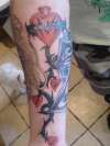 Pauls Heart and vine tattoo