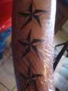 Pauls stars tattoo