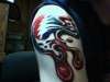 Melting Steal Your Face tattoo