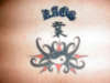 Kaos Karma tribal tattoo