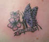 Purple Butterfly and Flowers tattoo