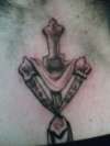 A cross to remember tattoo