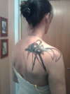 Blue black widow tattoo