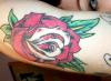 rose elbow tattoo