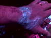 Blacklight Hennessy Logo tattoo
