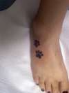 paw prints tattoo