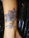 lily flower cover up tattoo