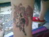 pink fairy with phoenix tattoo