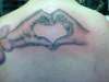 hands heart tattoo...fresh tattoo
