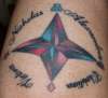 star upside down tattoo