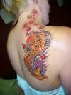 Koi fish with cherry blossoms tattoo