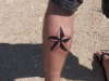 Texas star roughin it tattoo