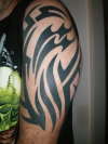 Aquarius Tribal tattoo