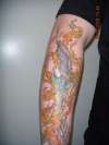 Flaming Biomech Dagger tattoo