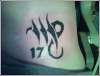 Tribal Virgo symbol tattoo