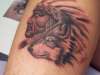 wolf and indian heads tattoo