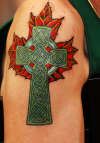 celtic cross on maple leaf tattoo