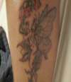 vined fairy tattoo