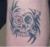 Skull and X bones tattoo