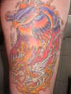 A PHOENIX IS BORN tattoo