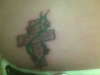 Cross w/ vines tattoo