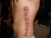 OE on ribs tattoo
