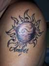 Sun with baby girls name tattoo
